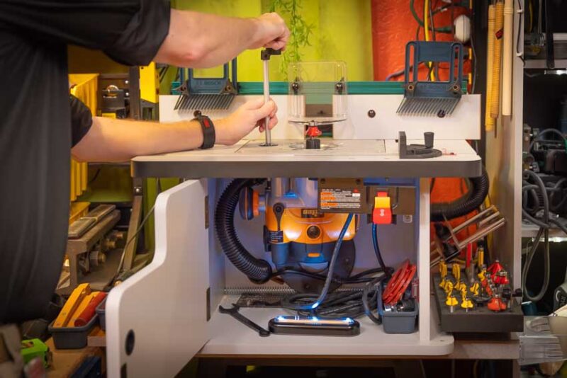 This Triton router is meant to be used on a router table and has a lift feature so you can raise and lower the bit from above the table.